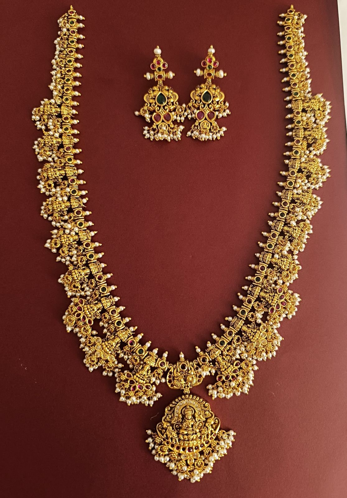 Antique laxmi pendent with Ruby Emerals stone with Gold polish