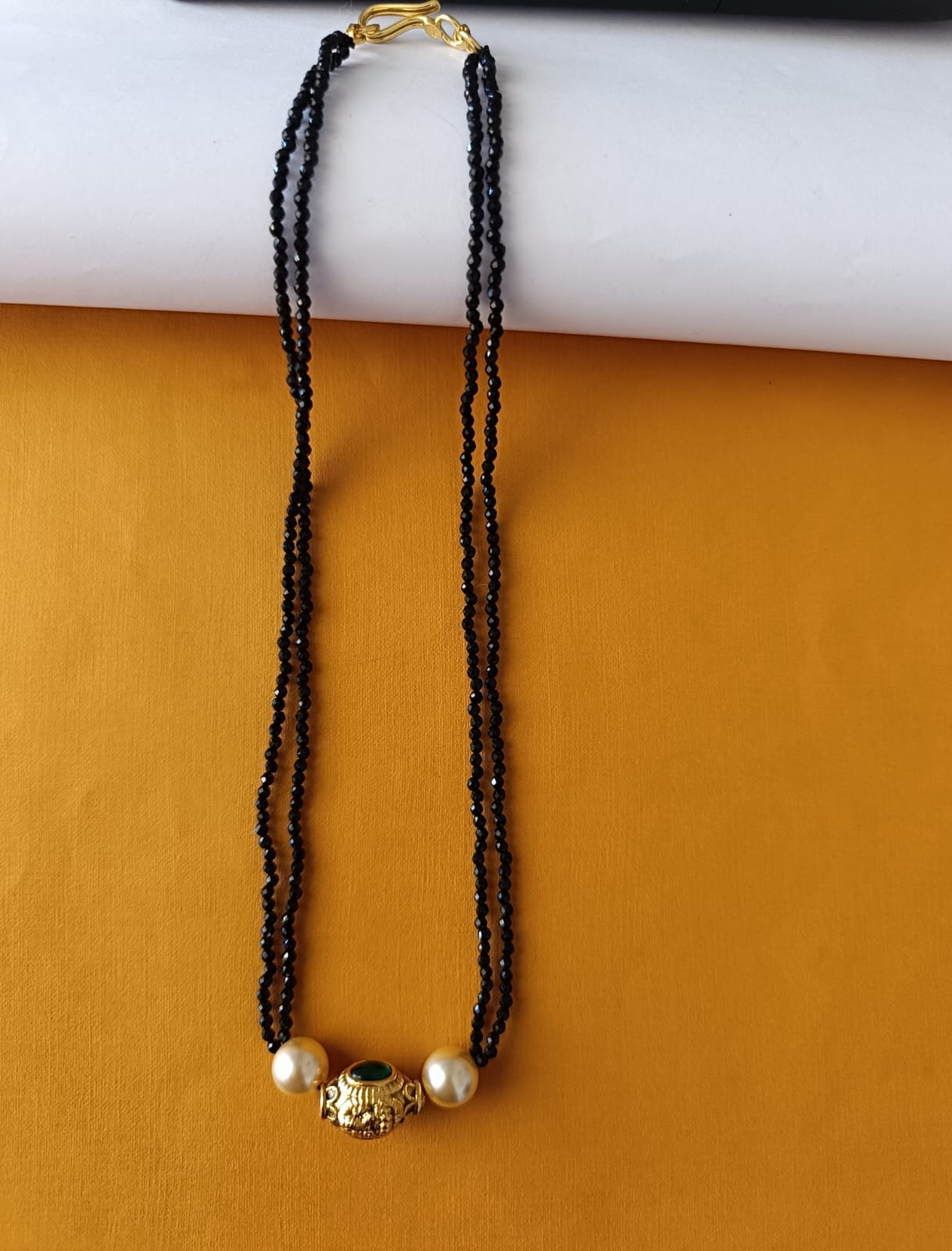 Black beads chain 2 lines  with gold  boll  and swarojki pearls