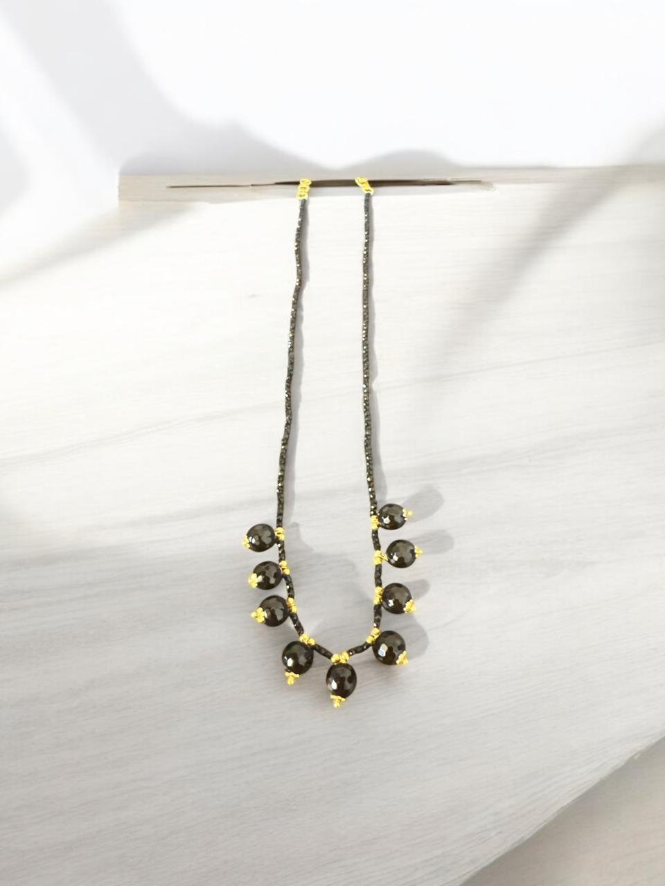Black beads chain with big size black beads and small size gold balls