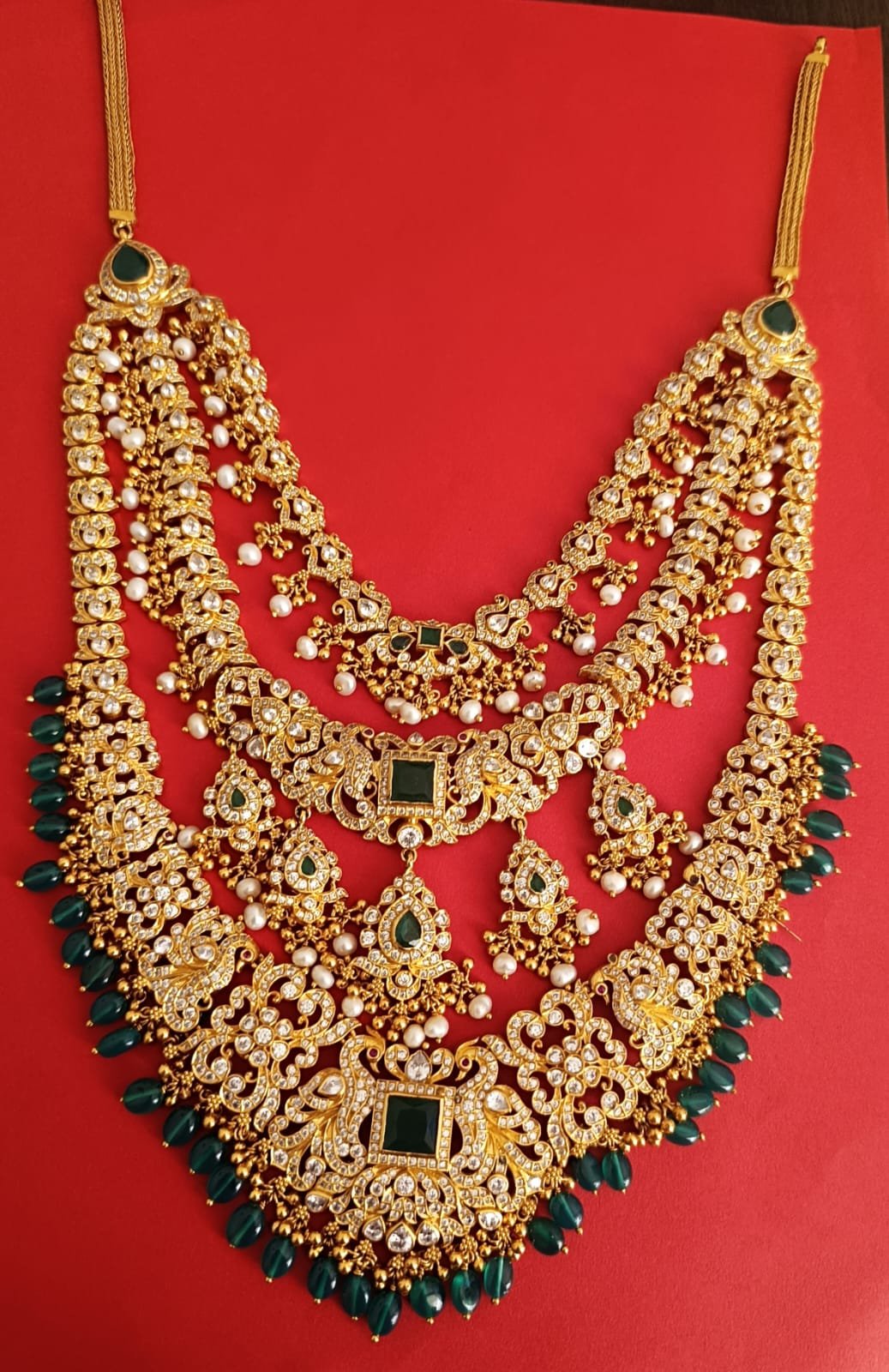 Cz and green stones with gold polish 3  lines  with green beads hangings  haram