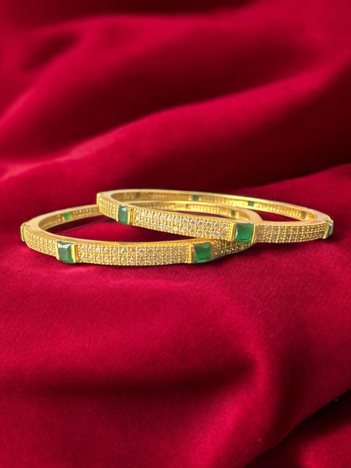 Cz stones  small  size  stones and green stone  with gold polish bangle