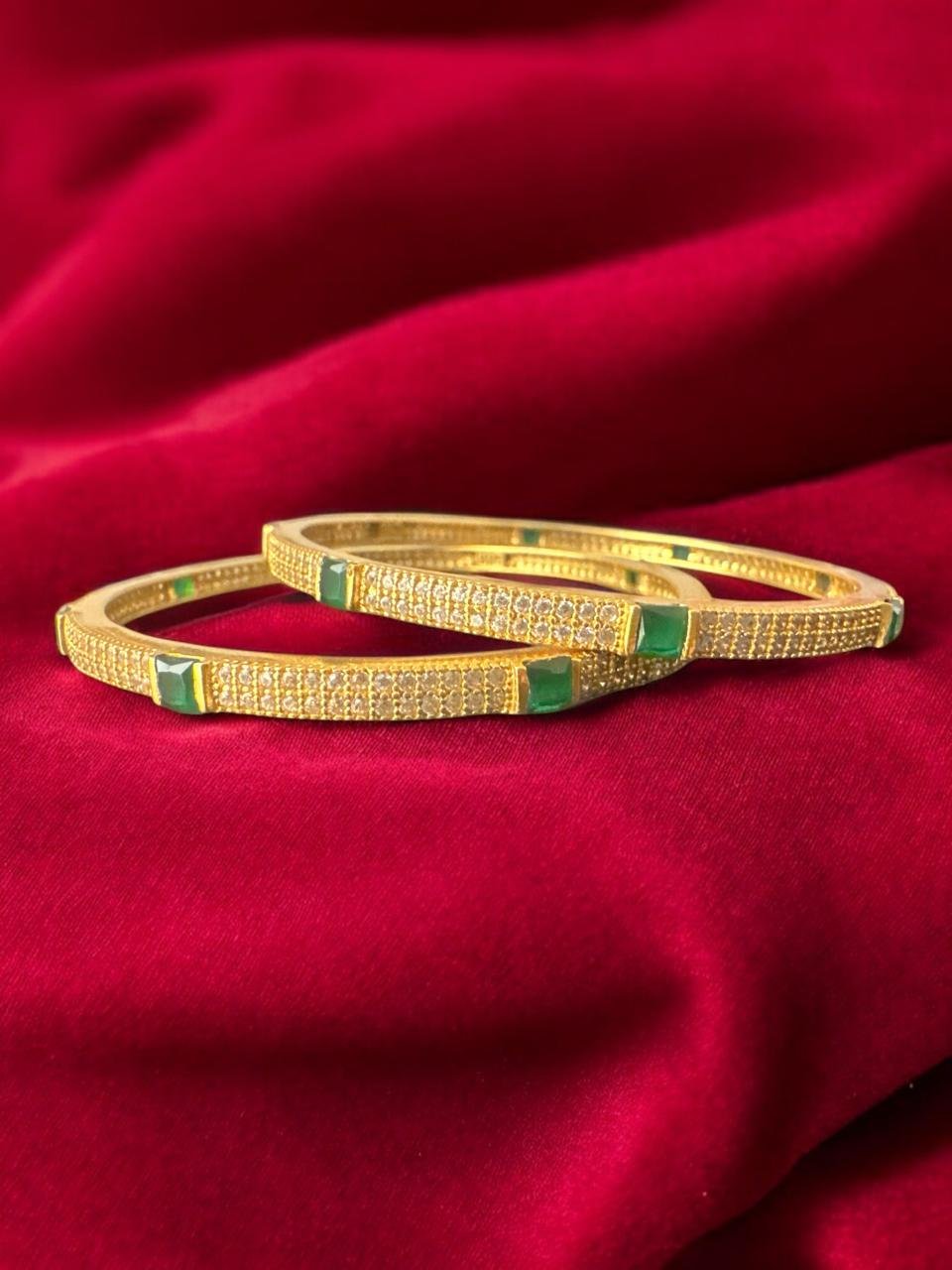 Cz stones with green stones  gold polish bangle