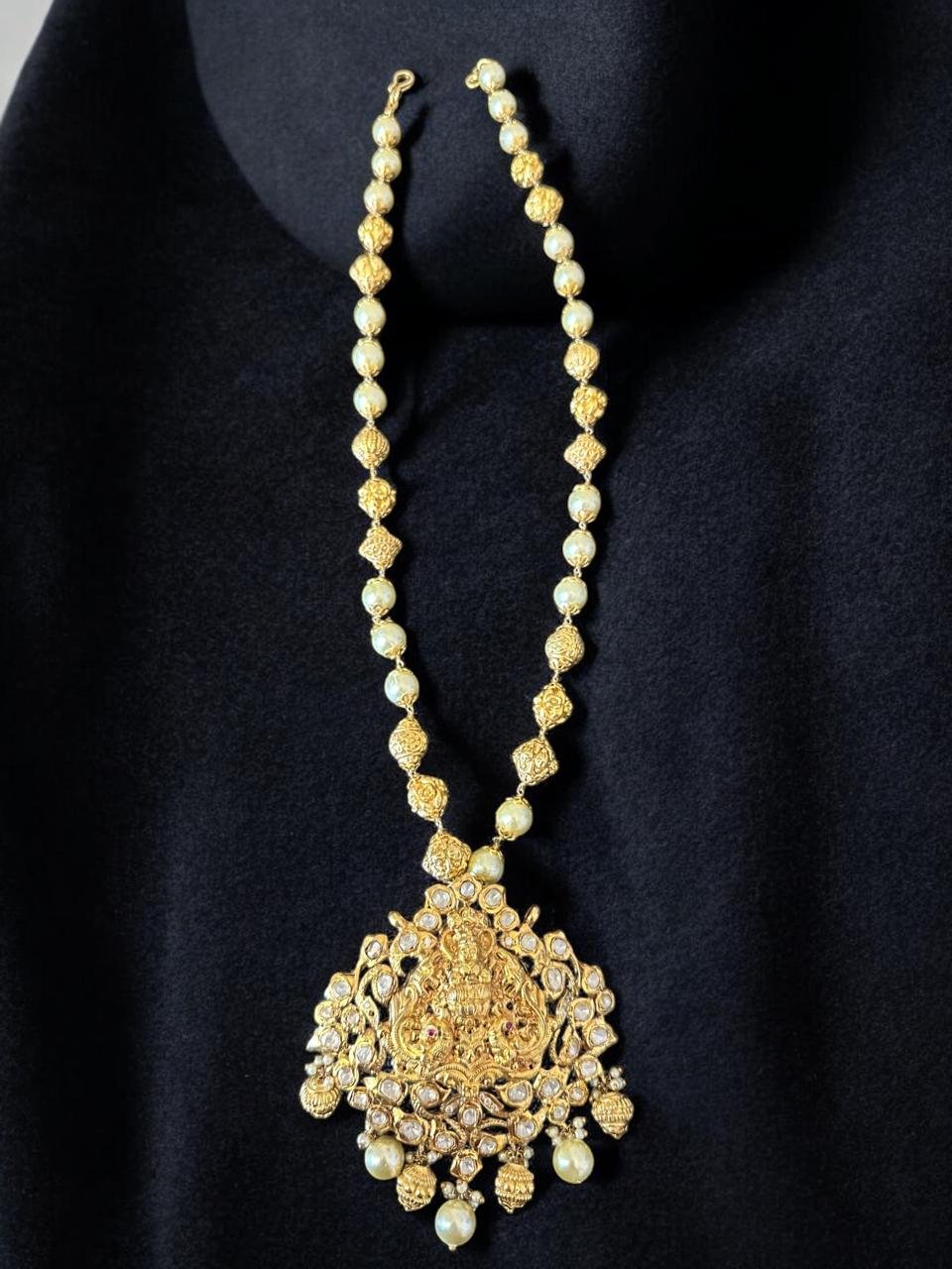 Gold balls  and  swarovski  pearls  with  laxmi pendent with  mozanite stone haram