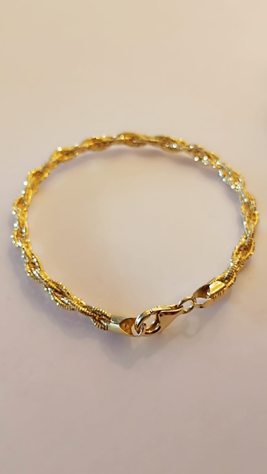 Gold polish bracelet with bangle model