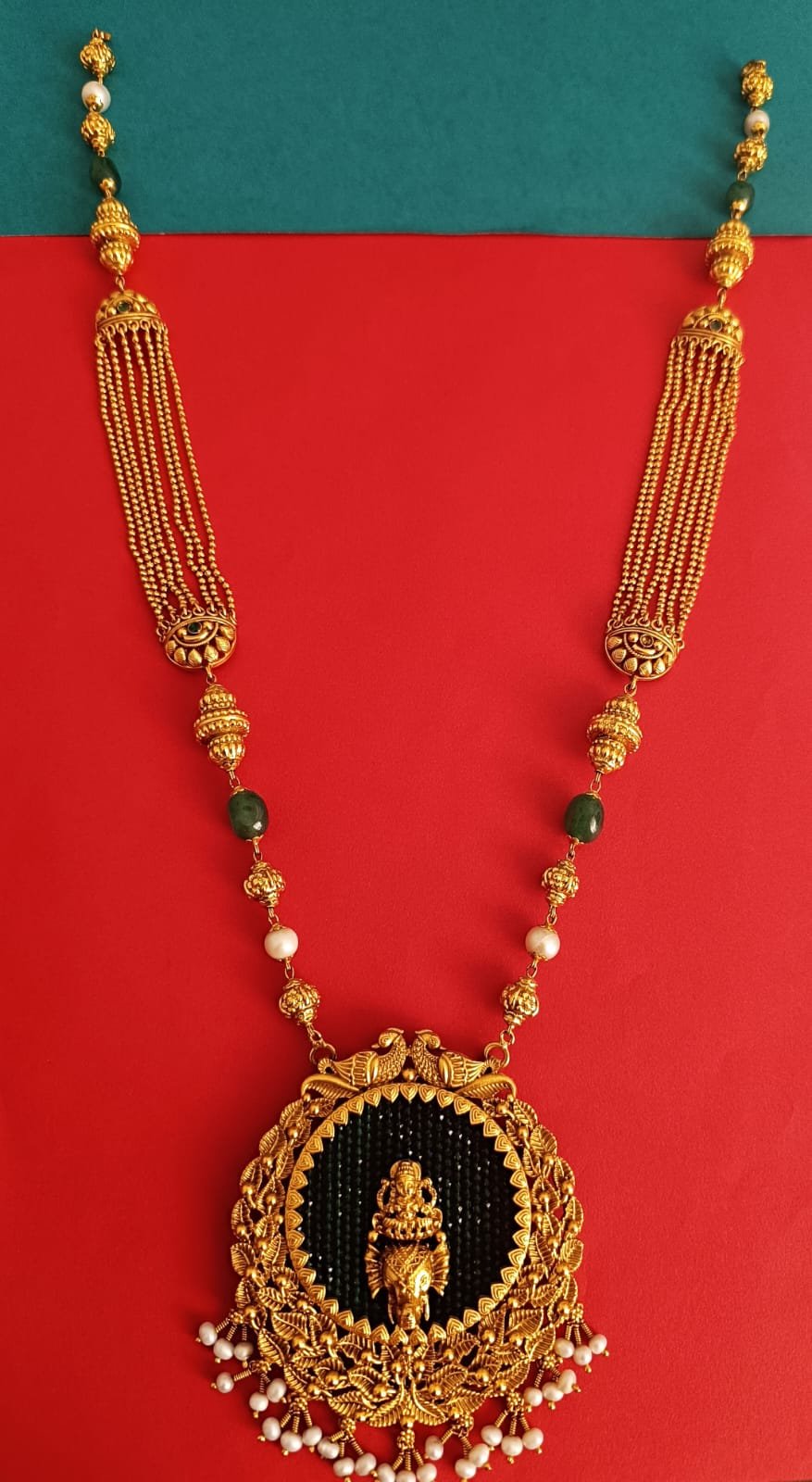 Gold polish chain modal with laxmi and  elephant design green  beads  small size  big pendent haram