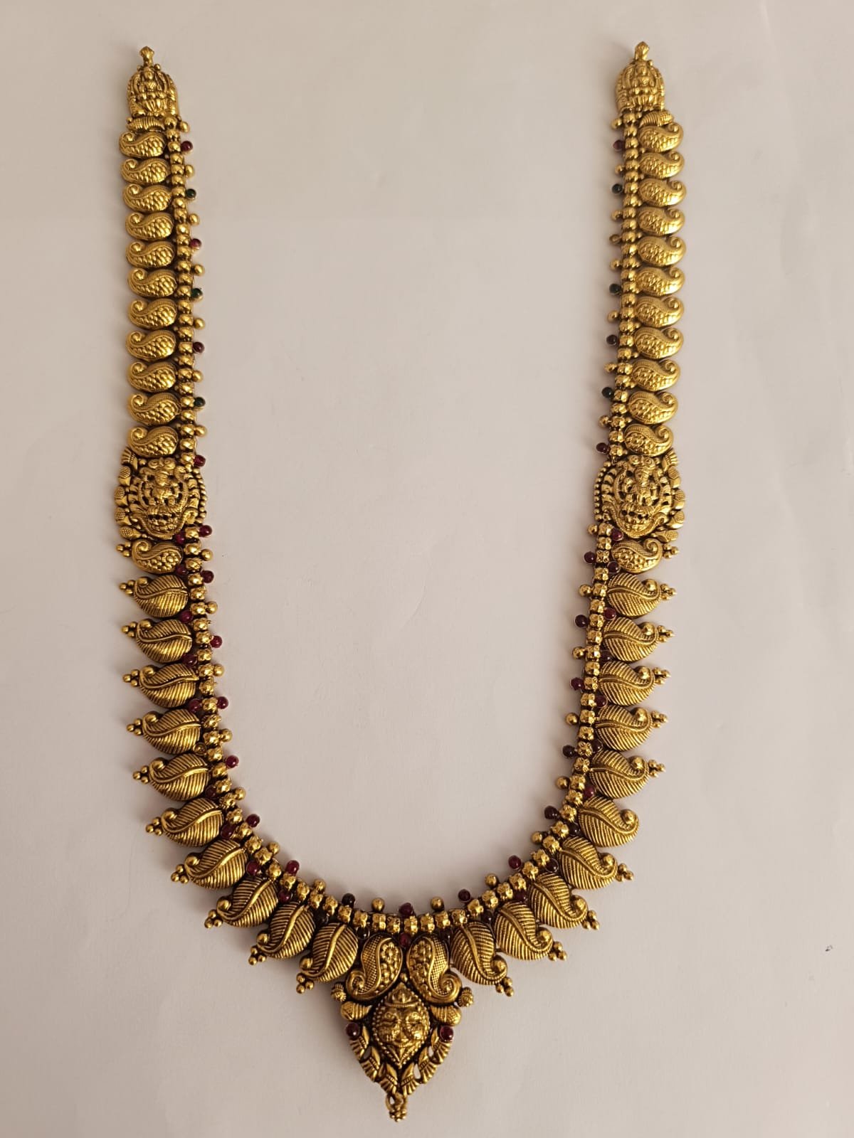 Gold polish  ruby stones with mango and leef model haram