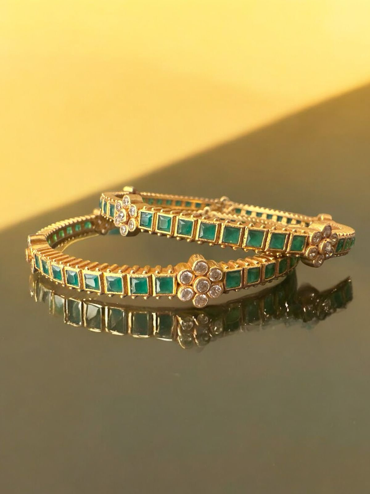 Green and white stones bangles with gold polish