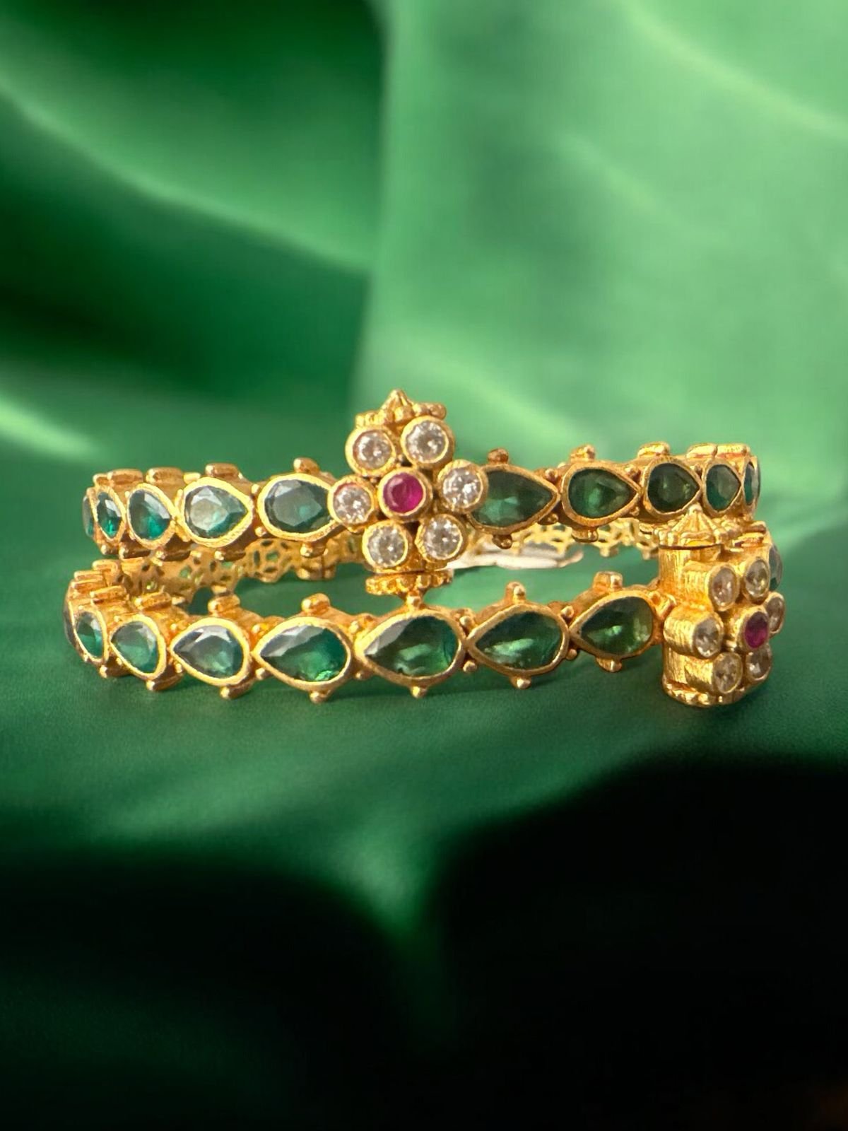 Green stones screw model bangles with gold polish