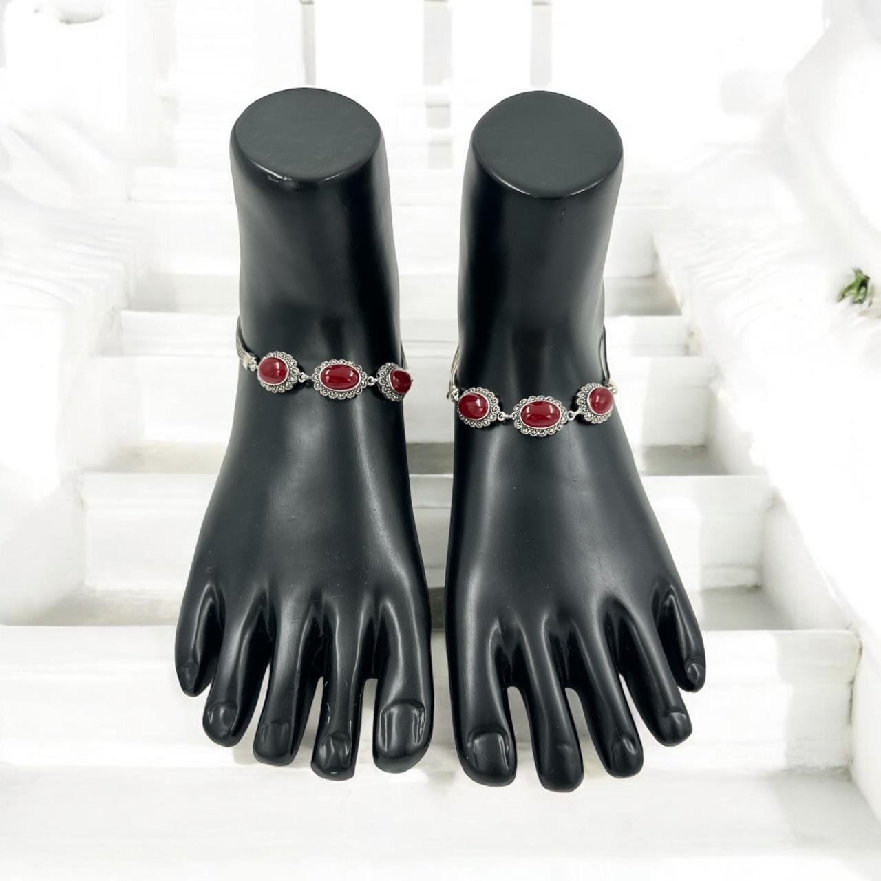 Marker stone with ruby anklets