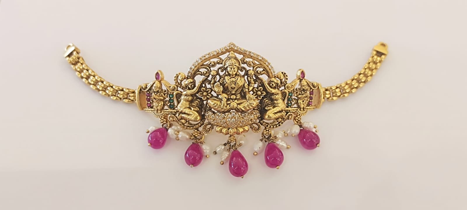 Nakshi design and Ruby and green stones and cz  white stones with gold polish choker