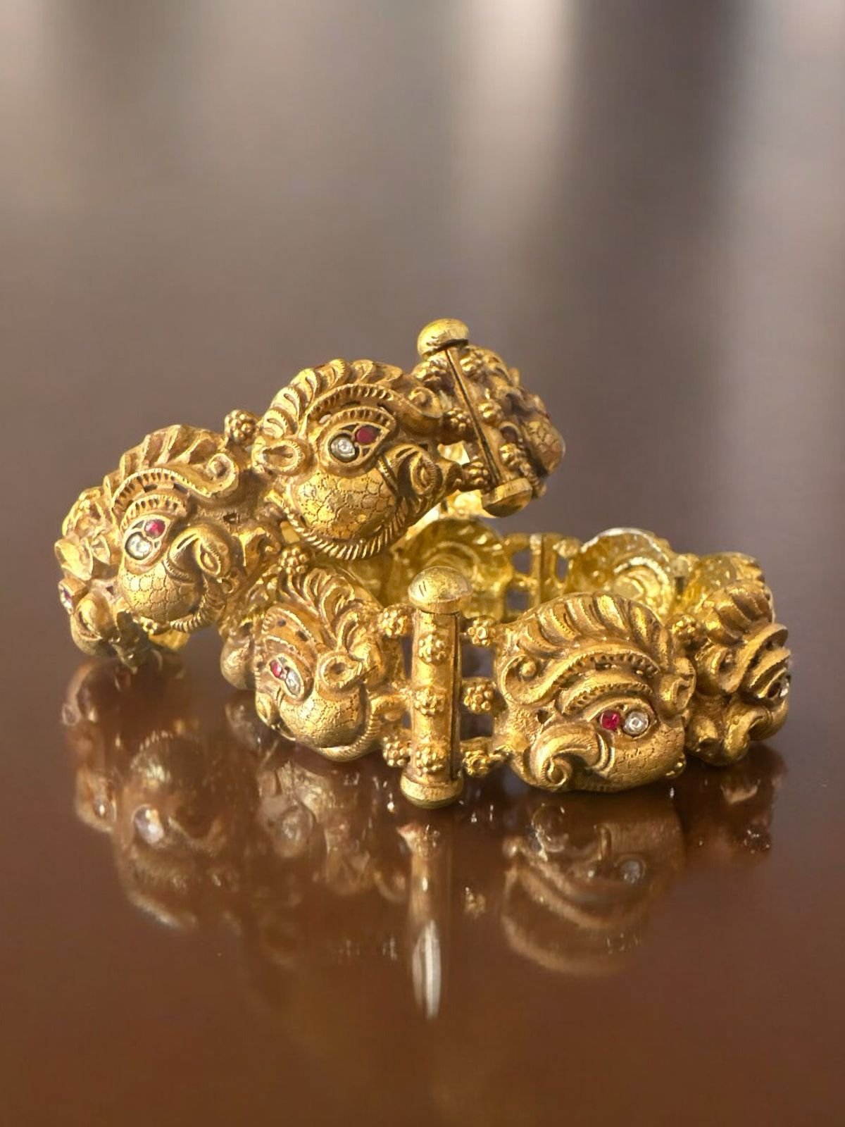 Peacock design bangle with screw model and gold polish