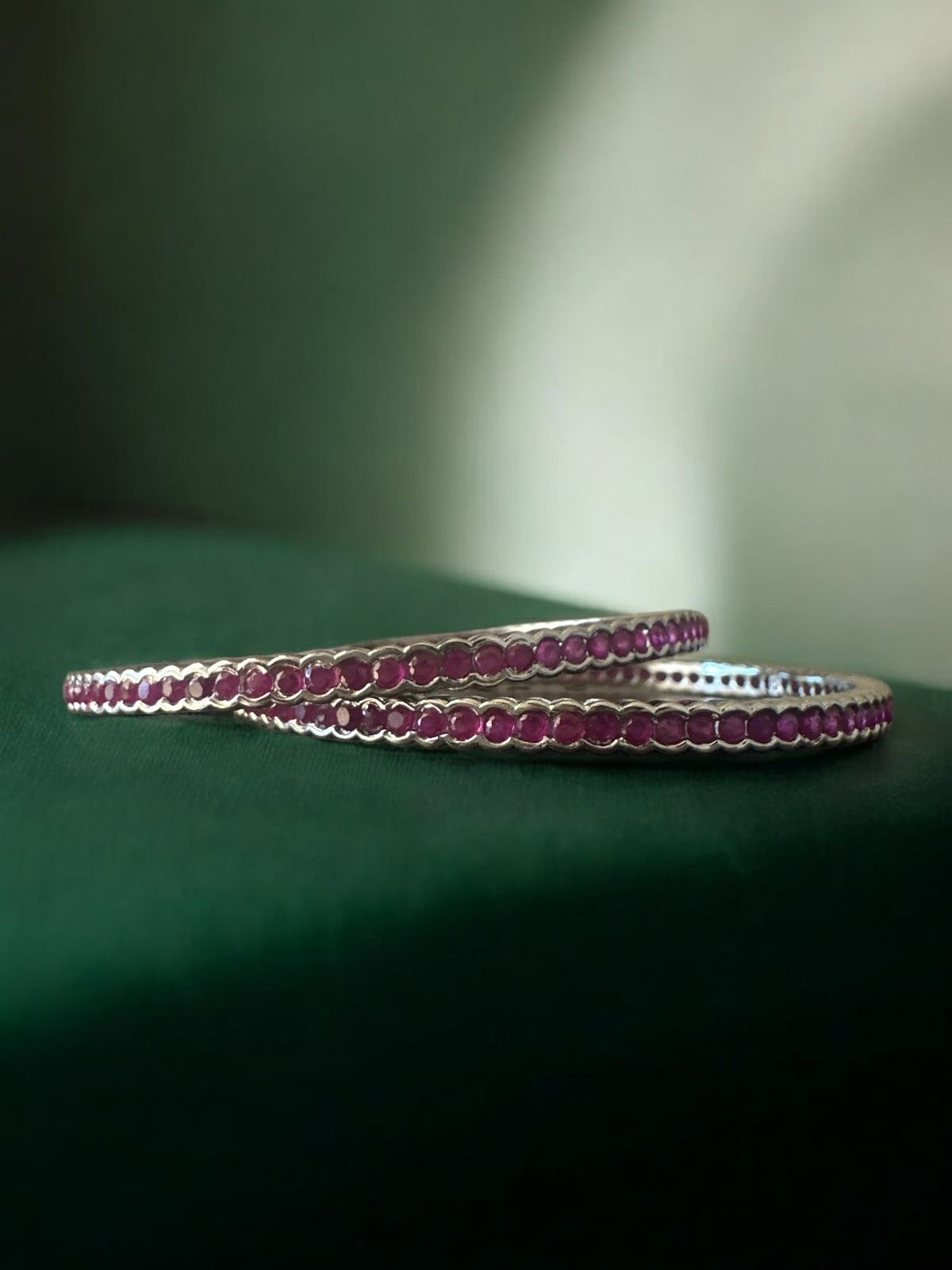 Pink stones bangle with silver polish