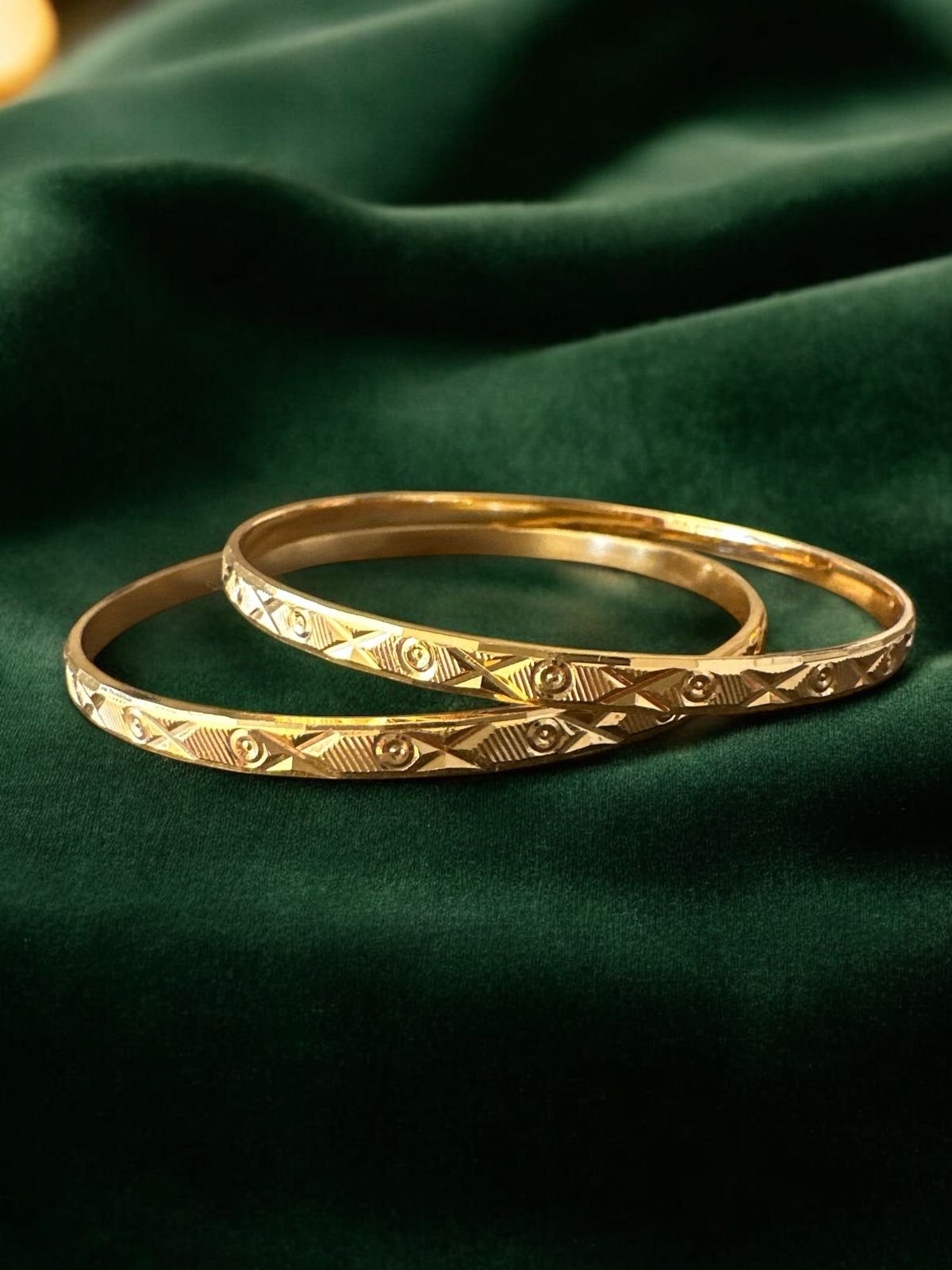 Plain bangles with gold polish
