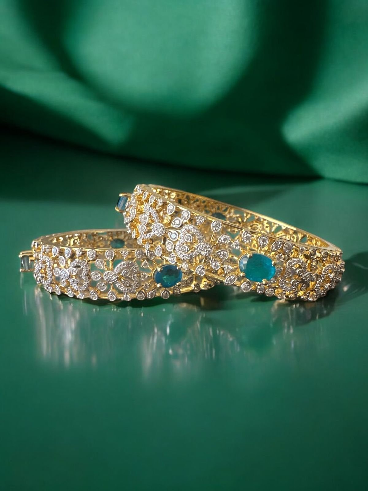 Premium cz green stones bangle with gold polish