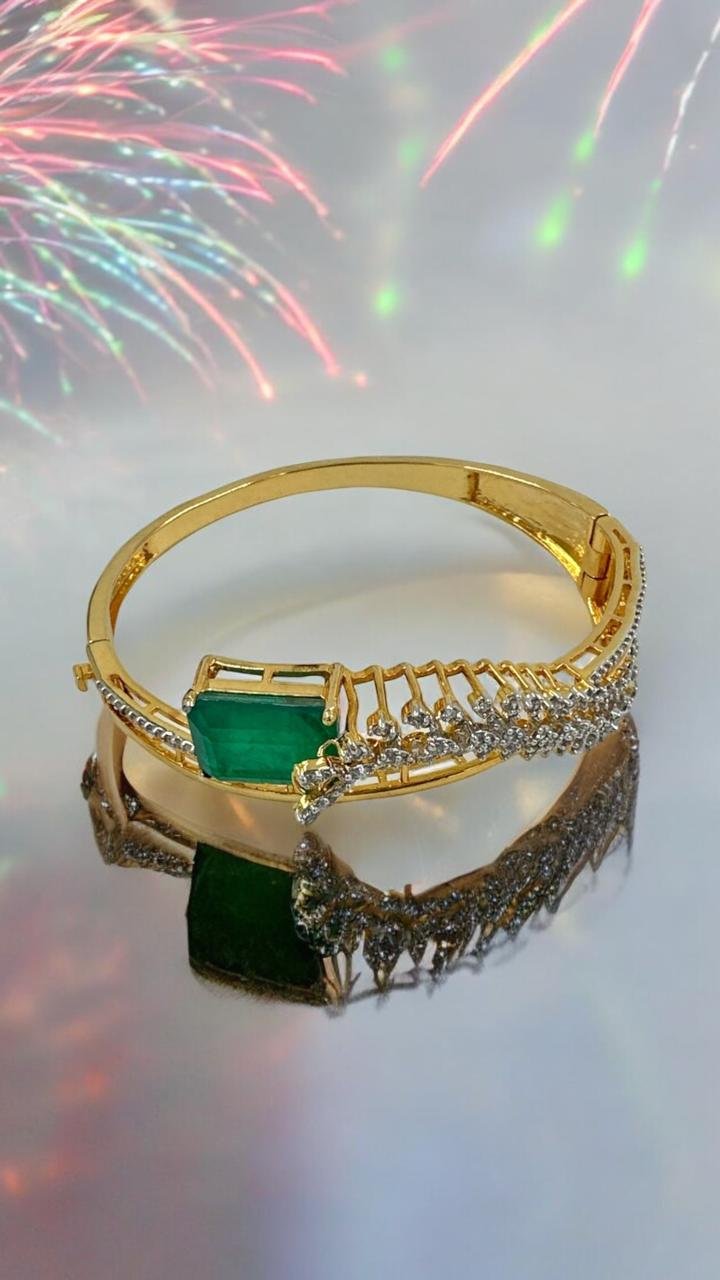 Premium cz stones with gold polish and green stone bracelet