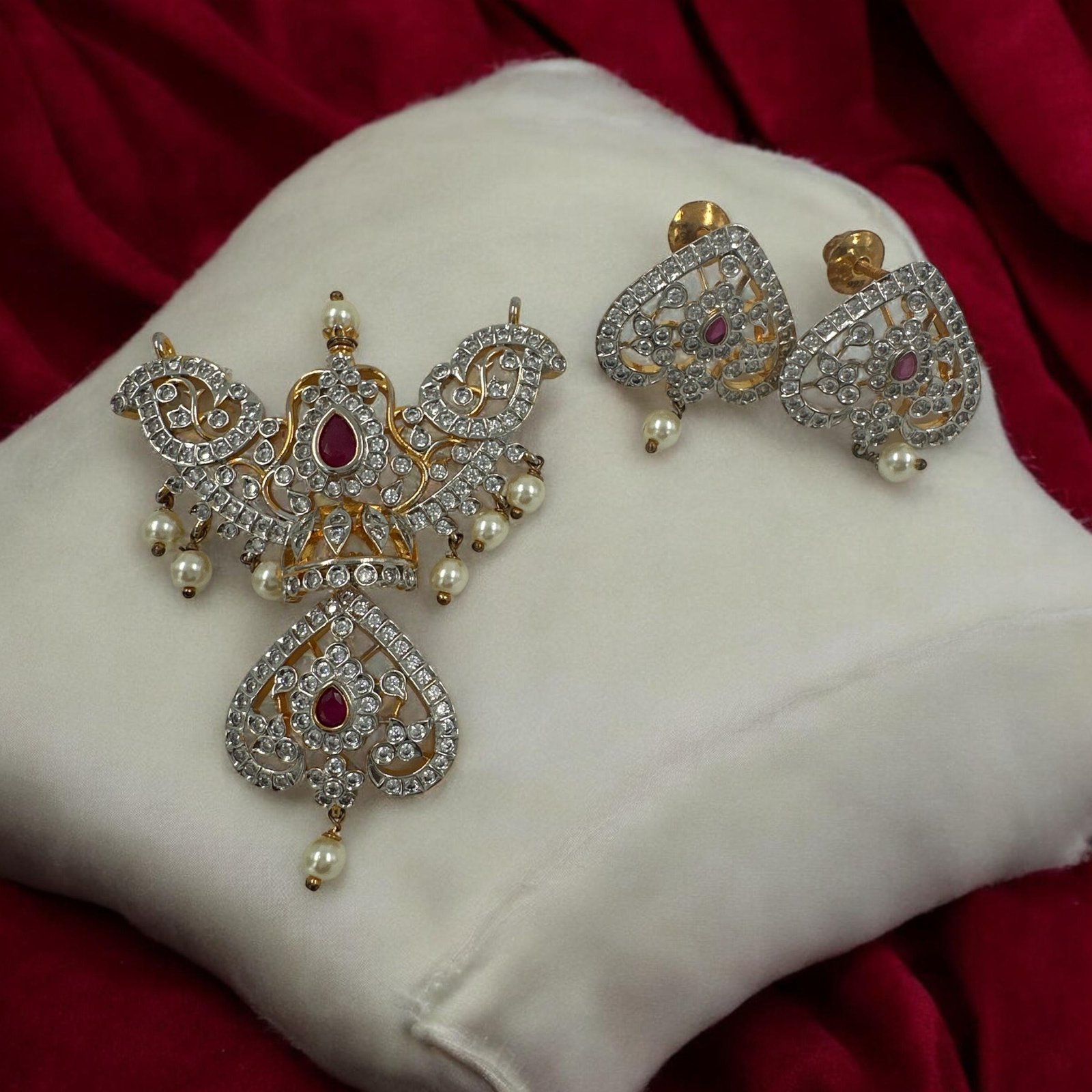 Premium cz stones with gold polish and red stone pendent  set