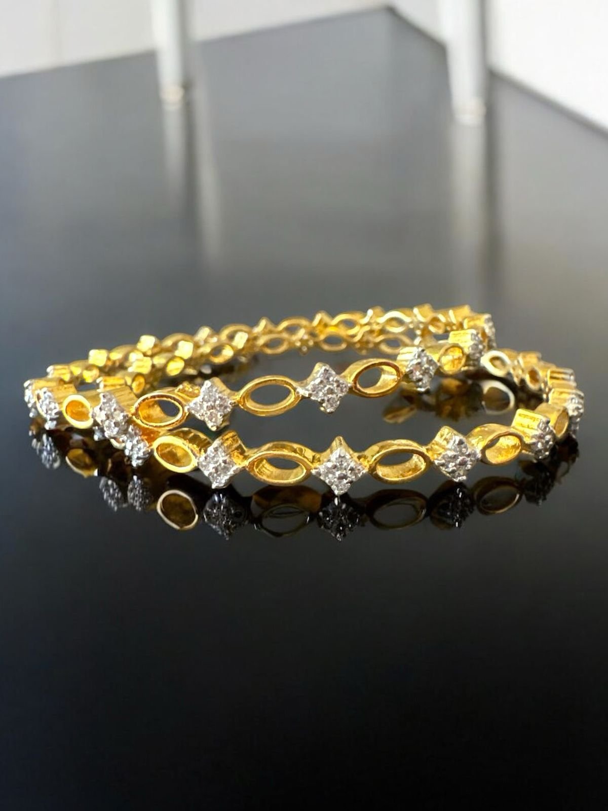 Premium cz stones with gold polish bangle