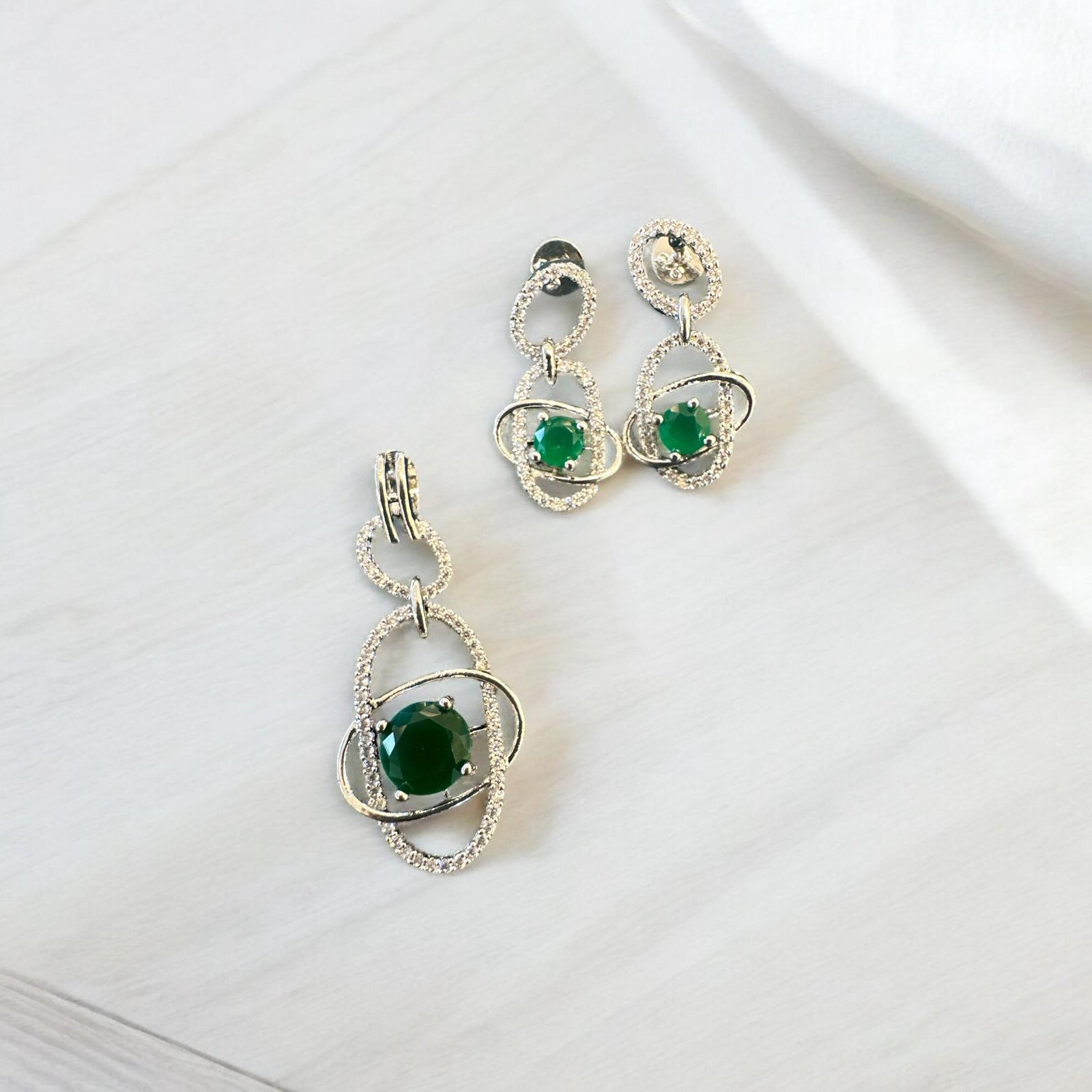 Premium cz stones with silver polish and green stones  pendent set