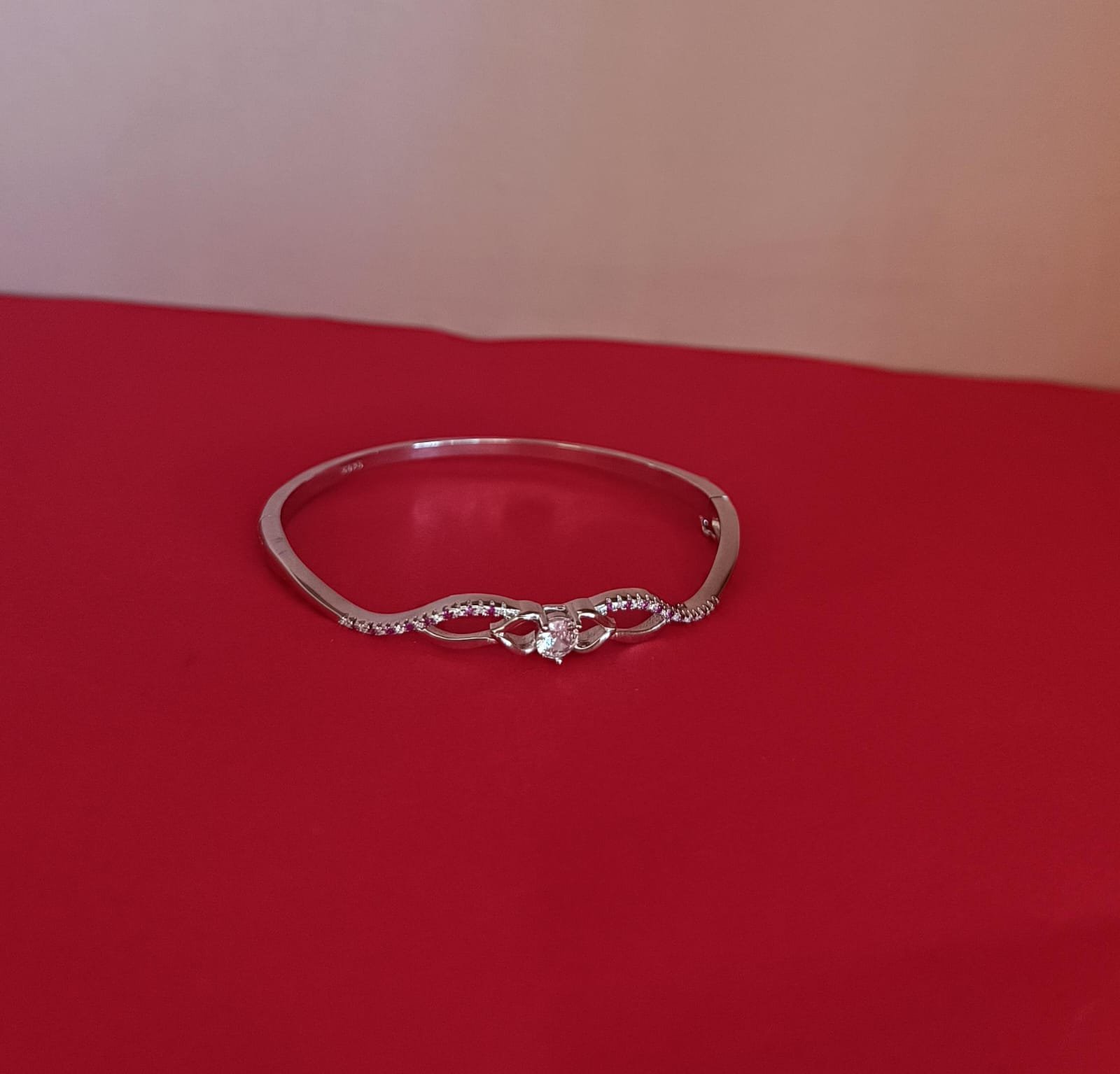 Premium cz stones with silver polish and white and pink stones bracelet