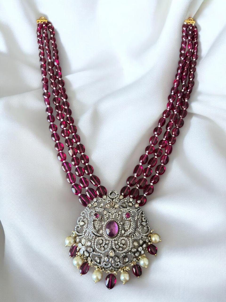 Ruby beads with Victoria pendent With Victoria polish  haram