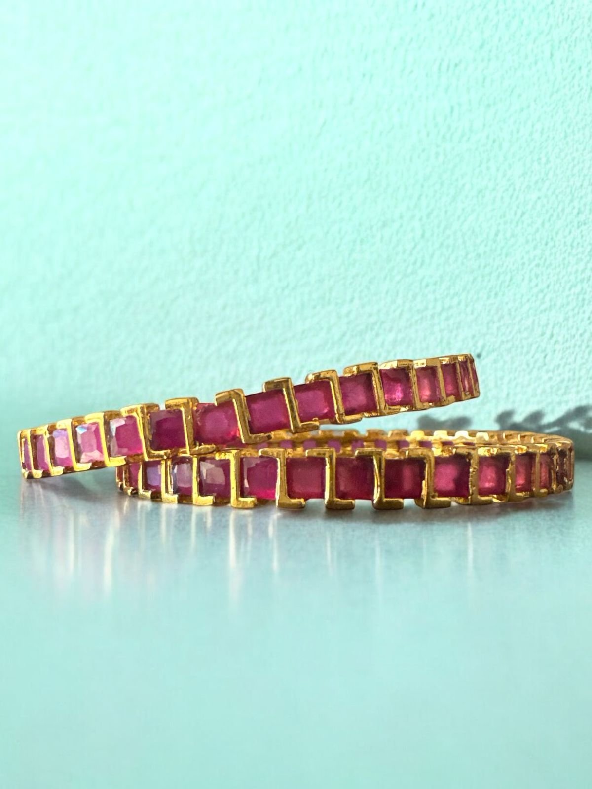 Ruby stone with gold polish