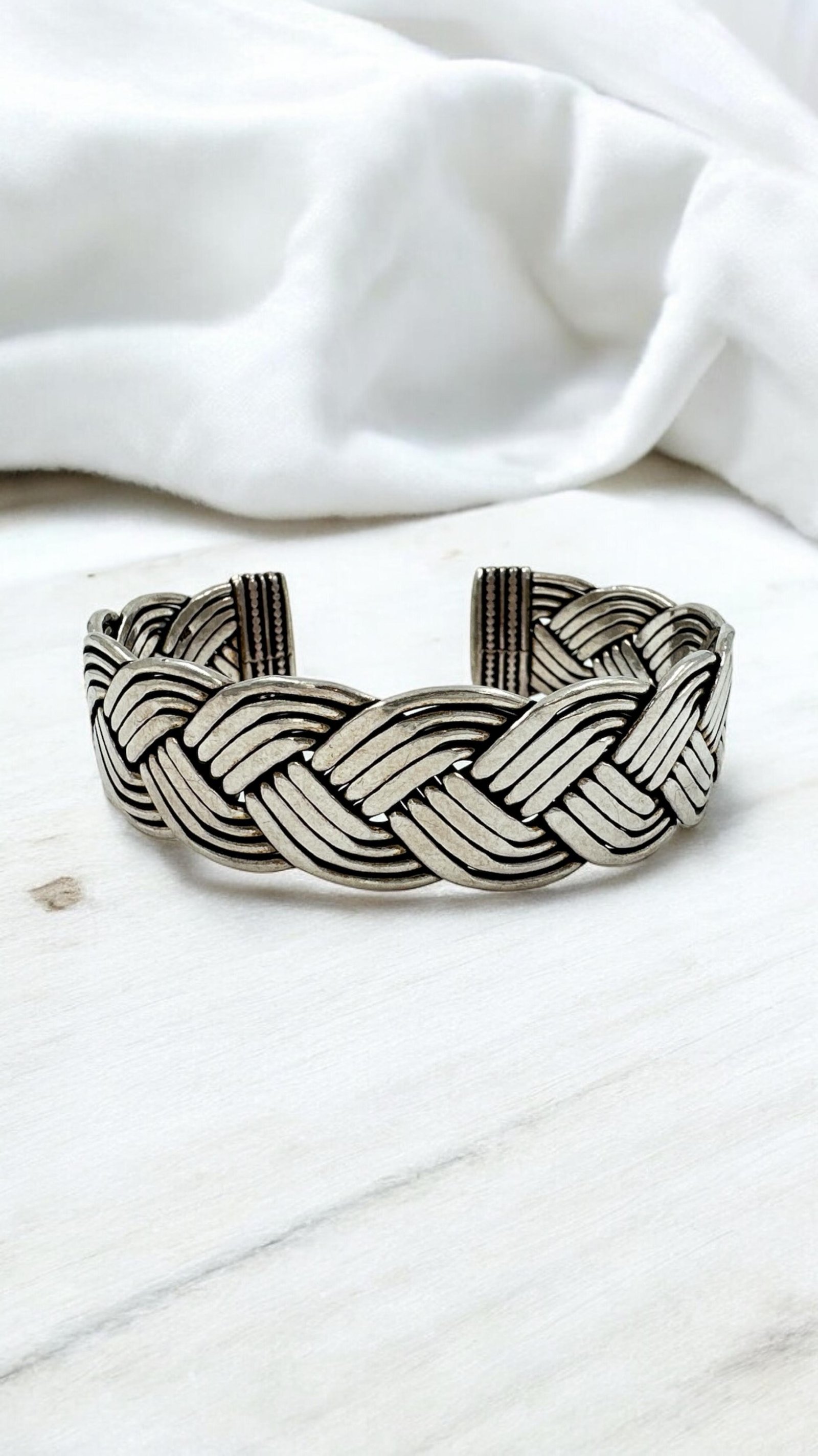 Silver men's kada with braided design