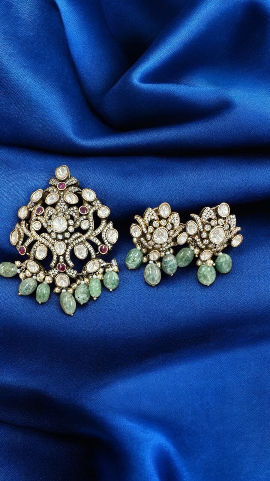 Victoria polish and mozanite stones and red  stones premium cz stones pendent set