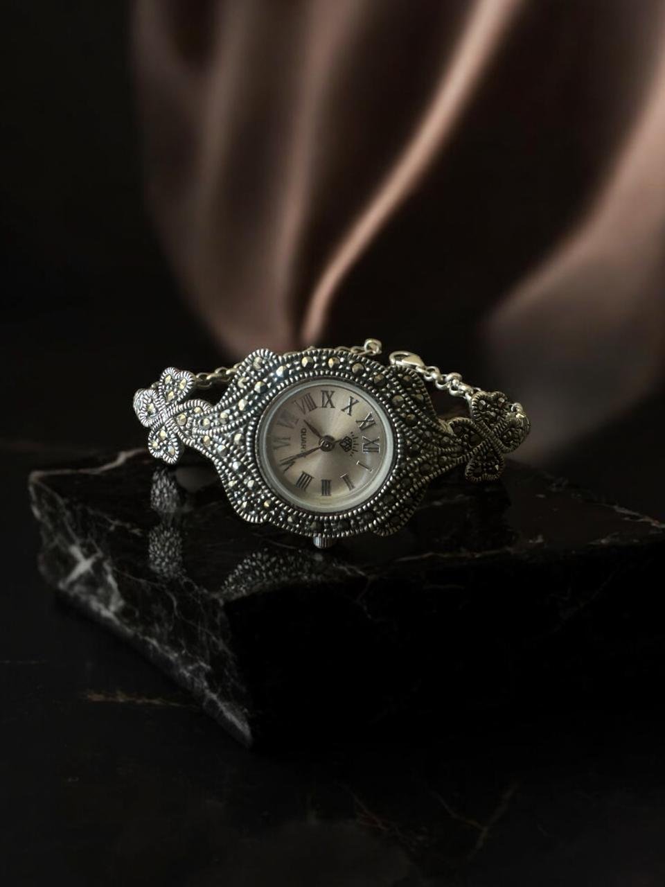 Women's watch with white stone
